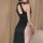 Sensual black cheongsam dress featuring side high slit, perfect for plus-size women seeking elegance and allure.