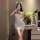 Elegant white lace floral bodycon slip dress with cat ears, perfect evening attire for women.