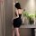 Elegant black lace floral bodycon slip dress with delicate floral design, perfect evening attire for women.