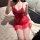 Woman wearing red yeyu lace babydoll nightgown, sheer strap dress with ties, elegant lingerie set for women.