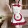 A cute bunny girl costume set featuring a fluffy white dress with red accents, perfect for christmas parties or cosplay event...