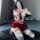 A person wearing a yiyue japanese schoolgirl lingerie set, featuring a crop top with lace details, ruffled skirt, and peek-a-...