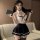 A stylish ensemble featuring a white halter top with black accents and a matching skirt, perfect for secretarial cosplay or i...