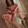 A woman poses in a yiyue sexy japanese-style kimono lingerie set featuring bold floral prints and an open-front design, perfe...