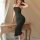 A woman poses elegantly wearing a black yiyue sexy lace nightgown, featuring a halter neck design, cutout details, and ties, ...