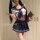 A stylish schoolgirl outfit featuring a sailor-style top with a navy blue ribbon and pleated skirt, perfect for role play and...