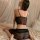 Sexy lace bodysuit paired with sheer skirt set, offering provocative uniform-style sleepwear ensemble for elegant allure.
