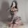 Woman wearing yue die sexy lace bodysuit & sheer mesh stockings set, posing on a fluffy rug with a phone covering her face.