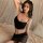 Elegant black lace bodysuit paired with sheer skirt set, offering a provocative uniform-style sleepwear ensemble for a chic l...