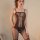 Woman wearing yuedie sexy lace bodystocking with garter straps - sheer mesh open-crotch bodysuit for women, featuring red tri...