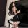 Elegant black maid costume with lace details, perfect for cosplay or roleplay. includes stockings and garter belt for a sensu...