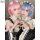 Two cosplayers wearing zero to hero re:zero maid outfits, featuring pink and blue wigs with floral headbands, creating a hear...