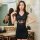 A woman wearing a black transparent lace nightgown, featuring sheer floral patterns, tight-fitting design, and puff sleeves, ...