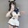Seductive schoolgirl lingerie set featuring a charming uniform outfit with ruffled layers, navy accents, and playful cat ears...