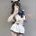 Seductive schoolgirl lingerie set featuring a charming uniform outfit with ruffled layers, navy accents, and playful cat ears...