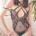 Sensual lingerie set featuring transparent lace with intricate designs, offering a delicate and seductive look. perfect for w...